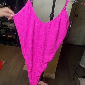 Good American never worn before one piece bathing suit